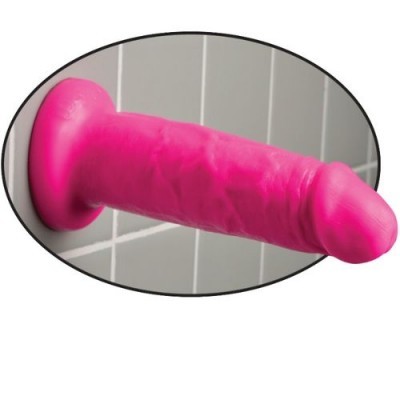 Dildo cor-de-rosa com base de sucção numa parede de azulejos