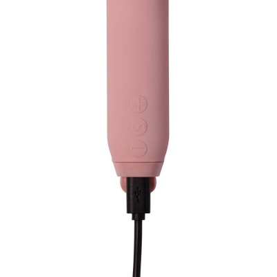 Dispositivo rosa claro com botão de volume e carregador USB