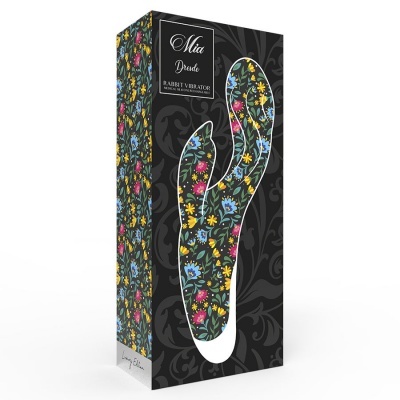 Caixa preta com padrão floral colorido e vibrador floral
