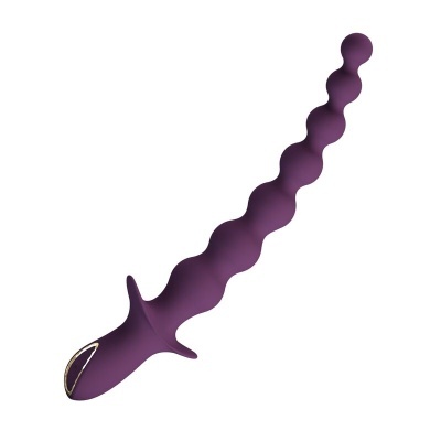 Produto roxo com bolhas e detalhe dourado