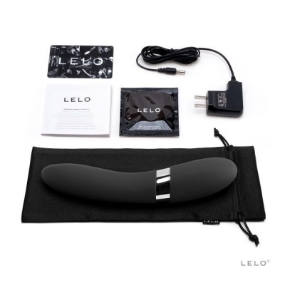 Vibrador preto com acessórios e embalagem da marca LELO