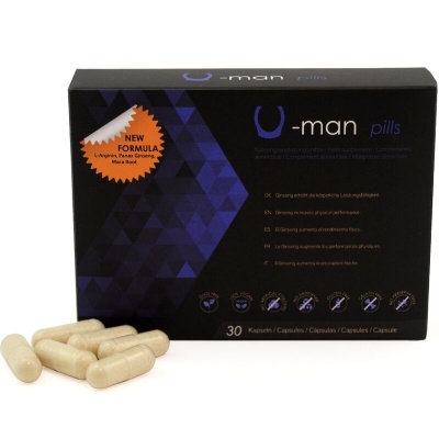 Caixa preta com detalhes azuis do suplemento U-man pills e cápsulas bege ao lado