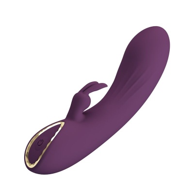 Vibrador roxo com parte chama coelho e botão de ligar dourado
