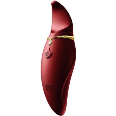 Vibrador feminino vermelho em silicone com detalhes dourados e textura lisa