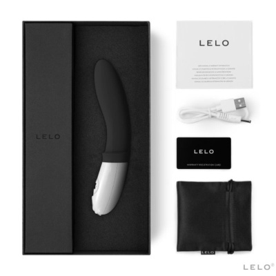 produto LELO preto e branco com acessórios em fundo branco