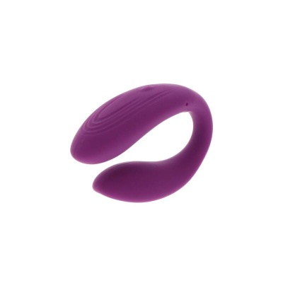Produto em silicone roxo com forma curva sobre fundo branco