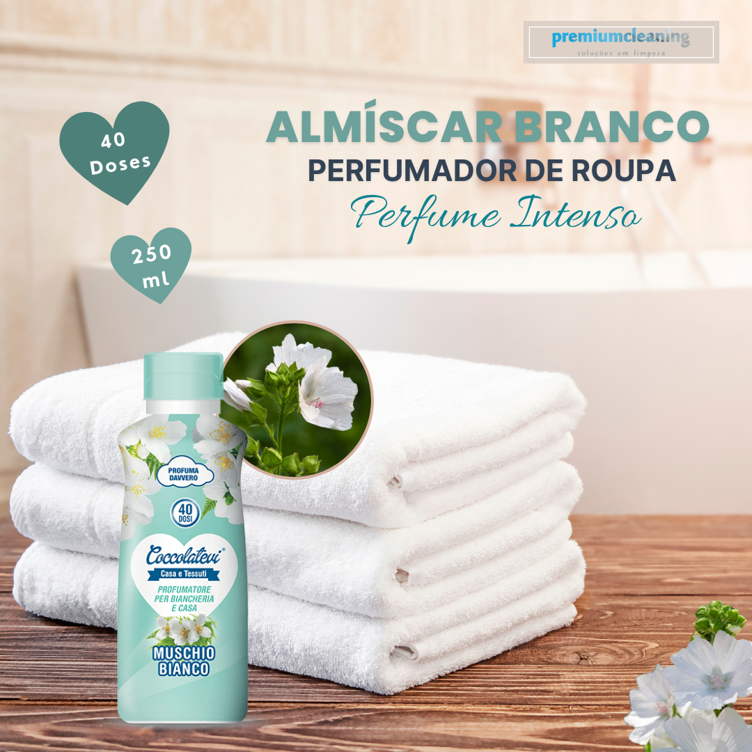 Almíscar Branco 250ml |Fragrância de lavandaria para máquina de roupa Perfume de roupa Coccolato Muschio Bianco ao lado de toalhas brancas e flores