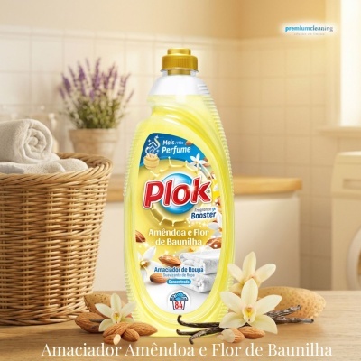Frasco amarelo de amaciador de roupa Plok Amêndoa e Flor de Baunilha com amêndoas e flores ao redor