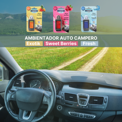 Três ambientadores para automóveis CAMPERO em embalagens coloridas sobre painel de carro com estrada rural ao fundo