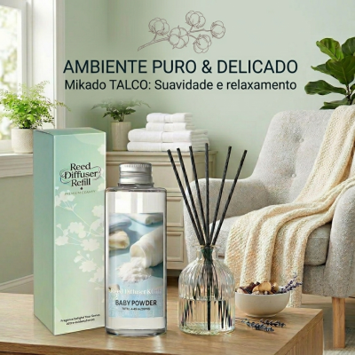 Difusor de ambiente com varetas e frasco em vidro transparente ao lado da embalagem verde clara