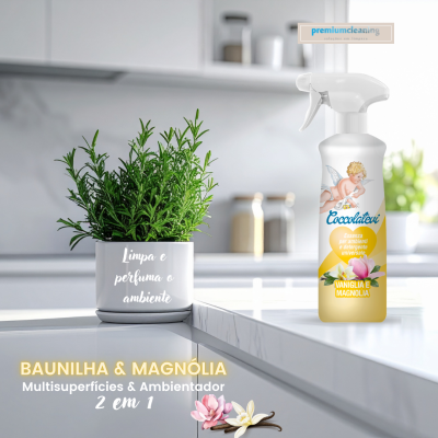 Frasco de spray amarelo com rótulo decorativo e planta verde em ambiente de cozinha moderno.