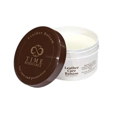 Bálsamo para couro TIME RESISTANCE em recipiente branco com tampa castanha.
