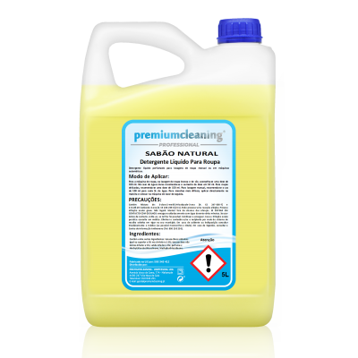 Recipiente de detergente líquido amarelo com tampa azul e etiqueta de aviso químico.