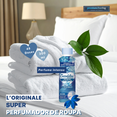 Perfume de roupa Coccolatevi LOriginale 300 ml com toalhas brancas e planta