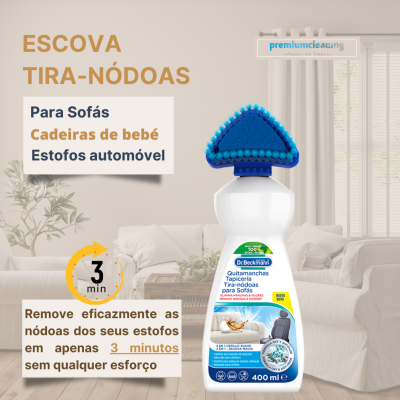 Frasco de produto limpa nódoas para estofos com escova azul numa sala de estar
