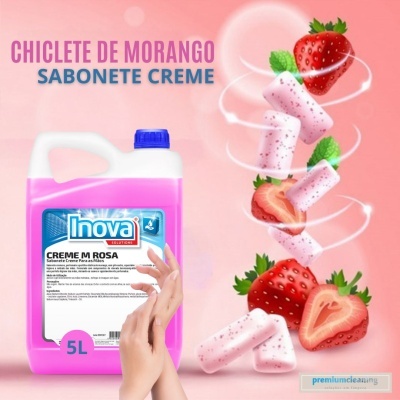 Frasco rosa de creme Inova de 5 litros com morangos e chicletes de morango ao fundo