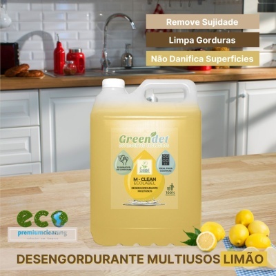 Recipiente de desengordurante multiusos limão numa cozinha, com limões frescos na mesa.