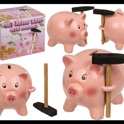 Cofre porco rosa com martelo e caixa