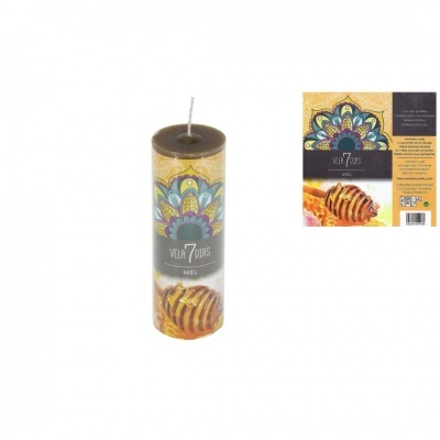 Vela decorativa com design colorido e embalagem com texto em português