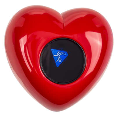 Objeto vermelho em forma de coração com símbolo central azul e preto