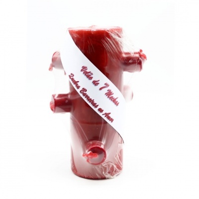 Produto plástico vermelho com conexões cilíndricas embalado em plástico transparente com faixa branca