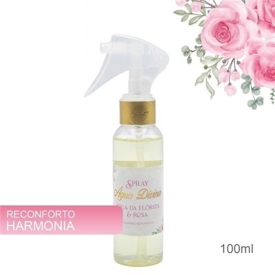 Frasco de spray Água Divina com essência da flórida e rosa, 100ml, fundo branco com flores rosa.