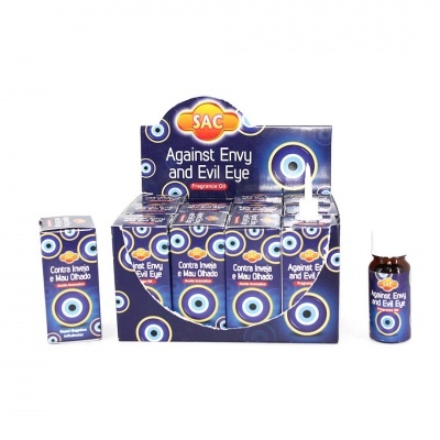 Frascos de óleo perfumado contra inveja e mau olhado com embalagem azul e círculos concêntricos