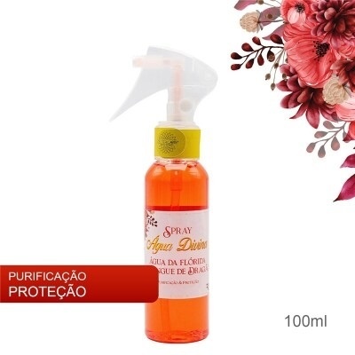 Frasco spray laranja com rótulo Águas Divinas e flores vermelhas ao lado