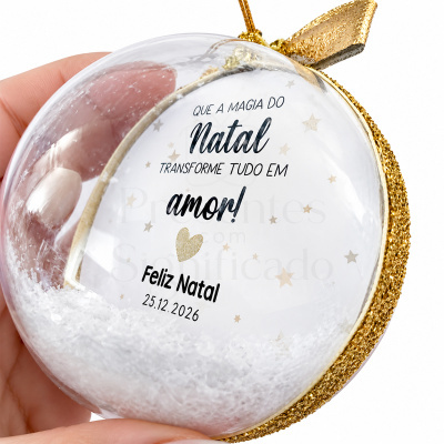Bola de Natal transparente com neve artificial e mensagem festiva impressa