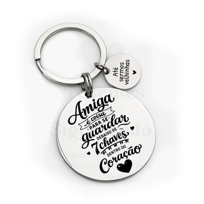 Porta-chaves metálico com frases em português em dois pendentes redondos