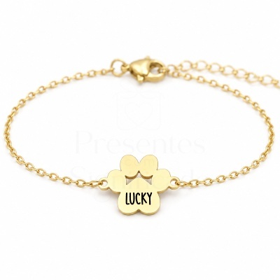 Pulseira dourada com trevo e palavra LUCKY