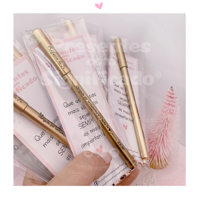 Conjunto de canetas douradas com mensagem em português e decoração rosa