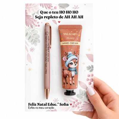 Conjunto de caneta cor-de-rosa e creme mãos com embalagem decorada de Natal