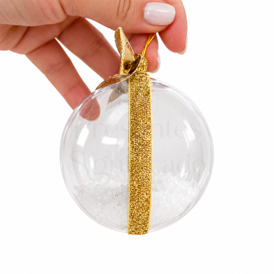 Bola de Natal transparente com decoração dourada e enchimento branco