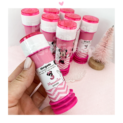 Tubo de bolhas de sabão rosa e branco com rótulo personalizado Minnie Mouse e texto em português.