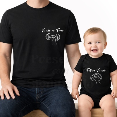 T-shirt preta de adulto com texto e desenho branco e body preto de bebé com texto e desenho branco.