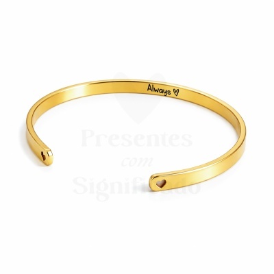 Pulseira rígida dourada com gravura interna Always ♥ e recortes de coração nas extremidades