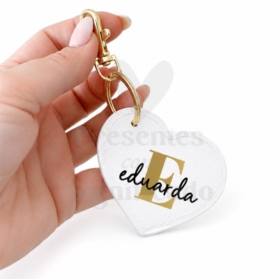 Porta-chaves coração branco com texto Eduarda em preto e dourado