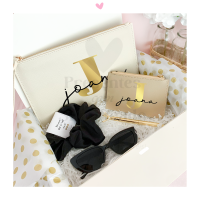 Conjunto de carteira, elástico, estojo e óculos de sol em caixa de presente