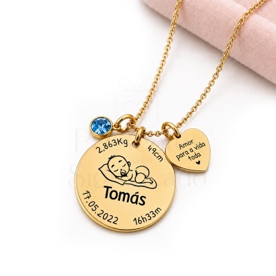 Colar dourado com pendentes redondo e coração e pedra azul