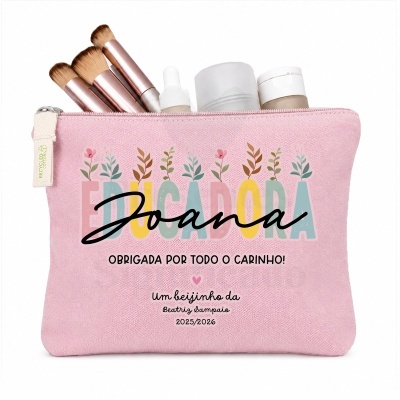 Necessaire rosa com texto personalizado e pincE9is de maquilhagem e frascos de cosmE9ticos dentro