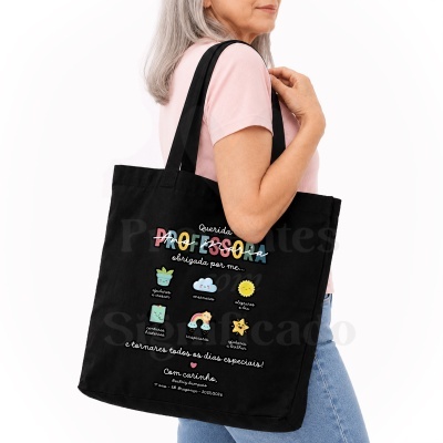 Mala tote preta com texto colorido e desenhos para professora