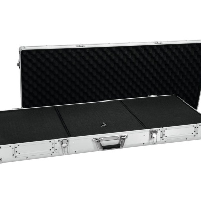 Estojo rígido aberto com interior em espuma preta e estrutura metálica