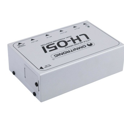 Equipamento eletrónico branco com texto LH-05I Domintronic e setas indicativas