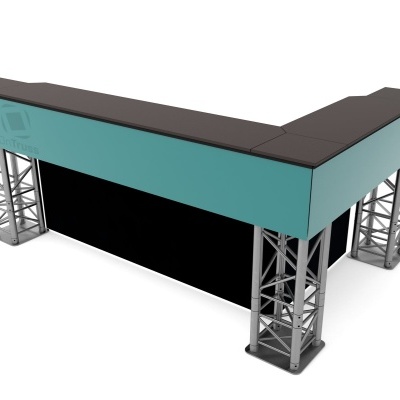 Balcão em L azul turquesa com estrutura metálica prateada e texto ATELIER