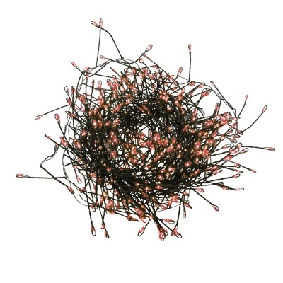 Fios pretos com pequenas luzes LED cor-de-rosa enrolados em círculo