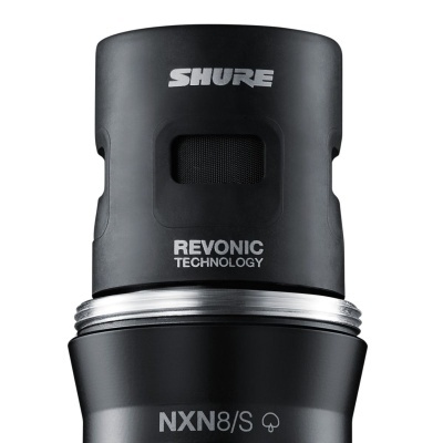 Microfone preto da marca Shure com texto Revonic Technology