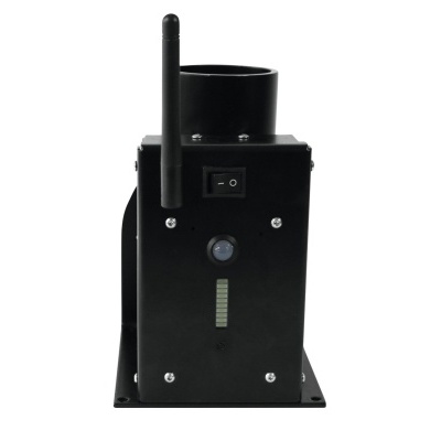 Dispositivo electrónico negro con antena y luces LED montado sobre base