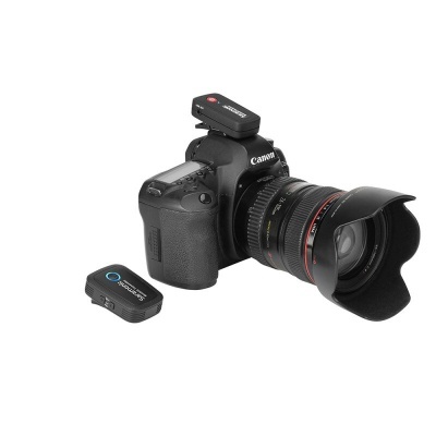 Câmara Canon com lente grande angular e dois dispositivos Wireless GO II