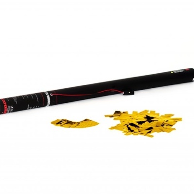 Tubo preto com detalhes vermelhos e branco ao lado de papel dourado recortado em estrelas